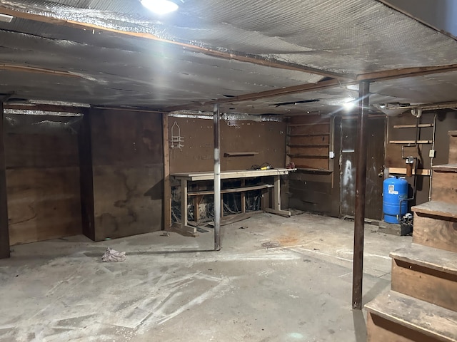 7 Kathryn St, Gorham, ME 04038 - unfinished below grade area with a workshop area
