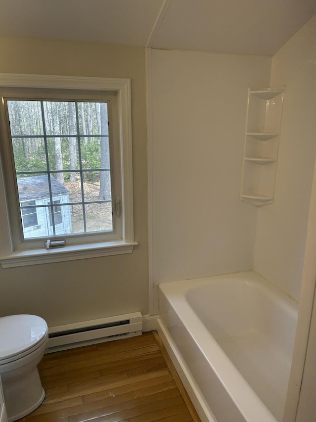 7 Kathryn St, Gorham, ME 04038 - full bath featuring toilet, a baseboard heating unit, and wood finished floors