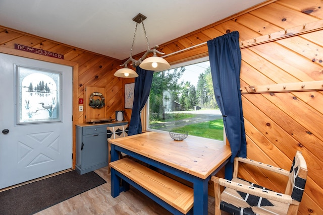 90 Manor Dr, Rangeley, ME 04970 - dining area featuring light wood-style floors and wooden walls