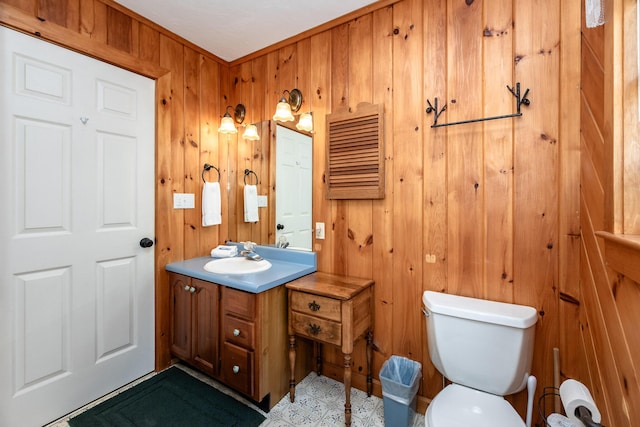 90 Manor Dr, Rangeley, ME 04970 - half bathroom with toilet, wood walls, and vanity