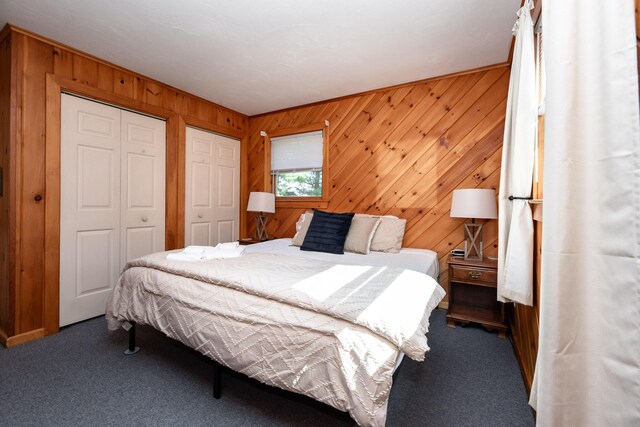 90 Manor Dr, Rangeley, ME 04970 - bedroom featuring carpet flooring and wooden walls