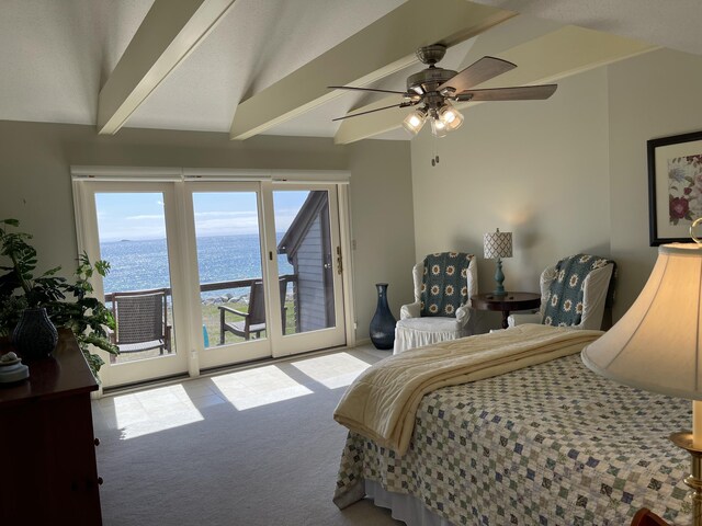 bedroom with a ceiling fan, a water view, carpet floors, beam ceiling, and access to exterior