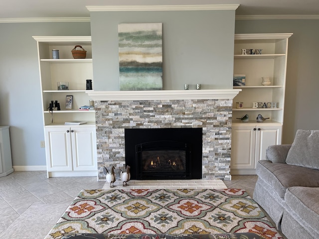 living room with light tile patterned flooring, a stone fireplace, crown molding, and built in shelves