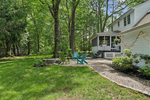 14 Pine Ledge Dr, Scarborough, ME 04074 - view of yard with a sunroom, a fire pit, and a patio area