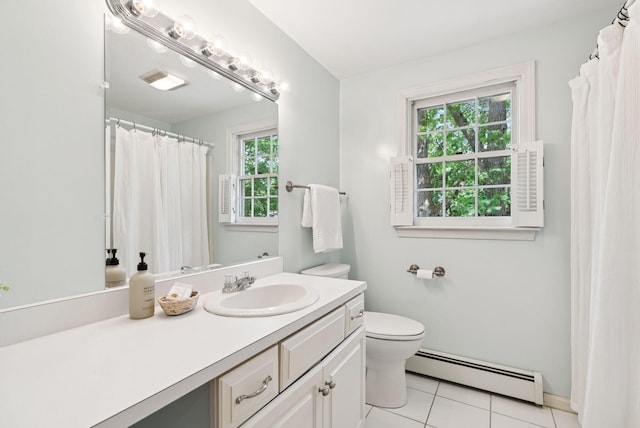 14 Pine Ledge Dr, Scarborough, ME 04074 - bathroom with a baseboard heating unit, healthy amount of natural light, vanity, and tile patterned flooring