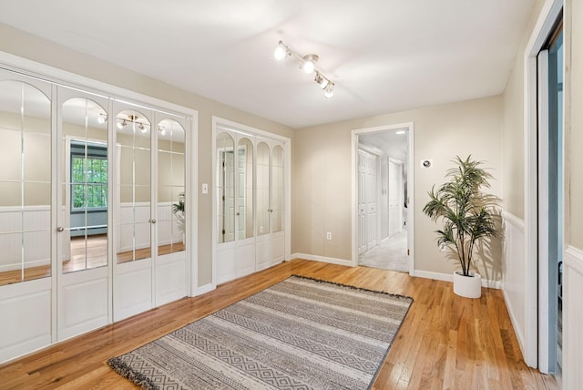14 Pine Ledge Dr, Scarborough, ME 04074 - entrance foyer featuring wood finished floors, french doors, and a baseboard heating unit