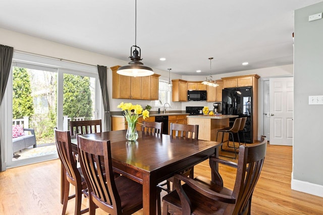 134 Yale St, Portland, ME 04103 - dining area with light wood-style flooring, recessed lighting, and baseboards