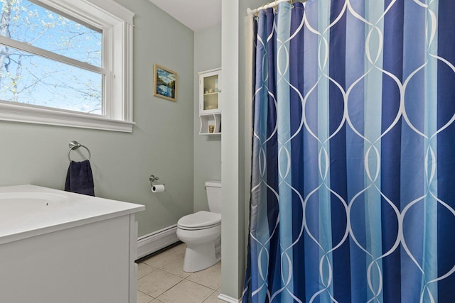134 Yale St, Portland, ME 04103 - bathroom featuring a baseboard heating unit, tile patterned floors, toilet, vanity, and a shower with shower curtain