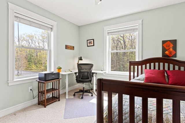 134 Yale St, Portland, ME 04103 - bedroom with carpet flooring, multiple windows, a desk, and baseboards