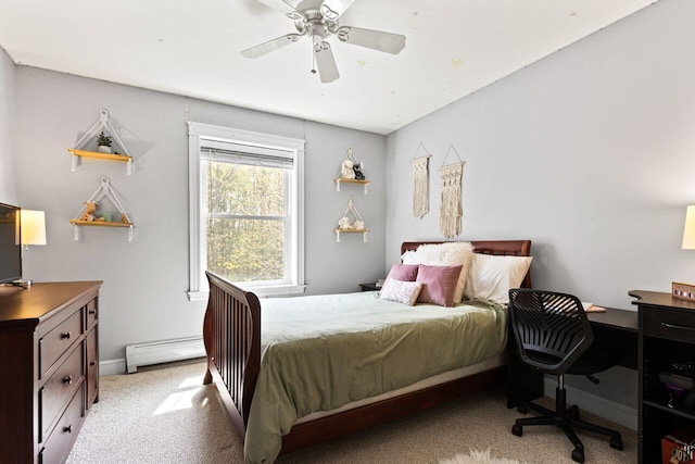 134 Yale St, Portland, ME 04103 - bedroom featuring a baseboard radiator, light carpet, an office area, and a ceiling fan