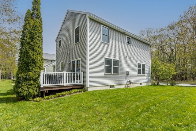 134 Yale St, Portland, ME 04103 - view of side of home with a deck and a yard