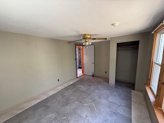 633 Norway Rd, Harrison, ME 04040 - unfurnished bedroom featuring baseboards and ceiling fan