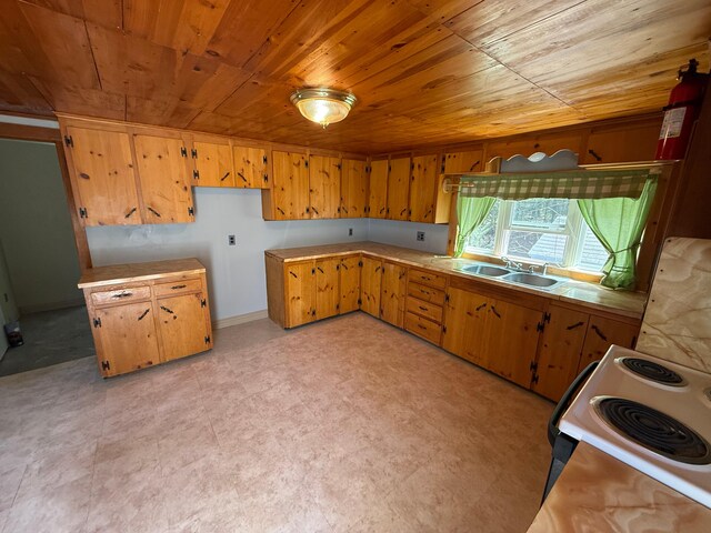 633 Norway Rd, Harrison, ME 04040 - kitchen featuring light countertops, wooden ceiling, a sink, and electric range