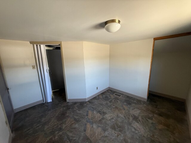 633 Norway Rd, Harrison, ME 04040 - unfurnished bedroom featuring baseboards, a closet, and visible vents