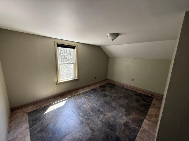 633 Norway Rd, Harrison, ME 04040 - additional living space with lofted ceiling and baseboards