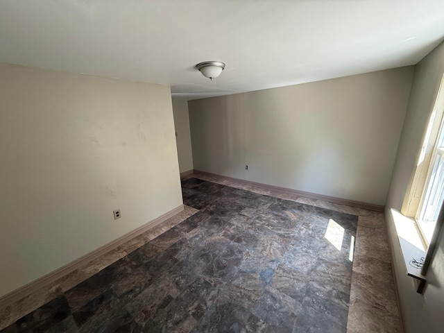 633 Norway Rd, Harrison, ME 04040 - unfurnished room featuring baseboards and stone finish floor