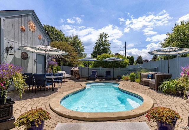 16 Howard Ave Unit 16, Wells, ME 04090 - view of swimming pool with a fenced in pool, fence private yard, and a patio area