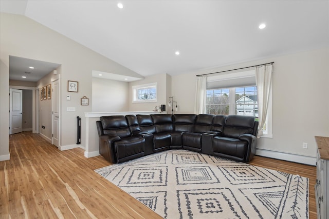 living area featuring baseboard heating, recessed lighting, baseboards, wood finished floors, and vaulted ceiling