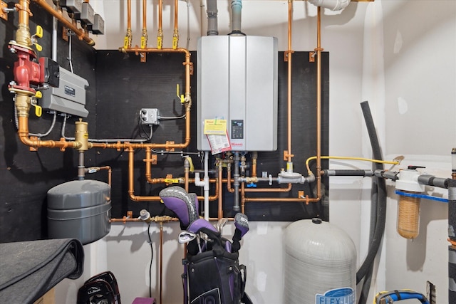 utility room featuring water heater