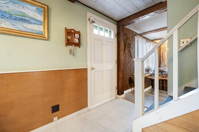 interior space featuring beam ceiling