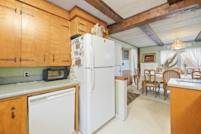 kitchen featuring beam ceiling, a toaster, white appliances, and light countertops