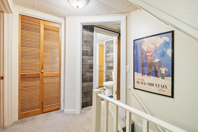 hallway with carpet flooring