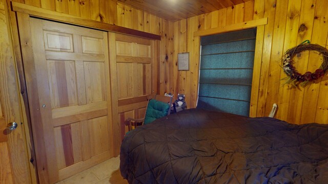 86 Webb Cove Dr, Lowell, ME 04493 - bedroom with wooden walls and wooden ceiling