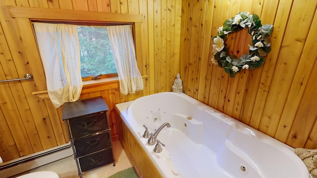86 Webb Cove Dr, Lowell, ME 04493 - bathroom with wood walls, a baseboard radiator, and a whirlpool tub