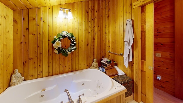 86 Webb Cove Dr, Lowell, ME 04493 - full bathroom featuring a jetted tub and wood walls