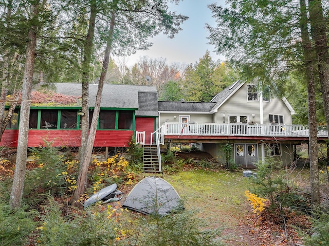 86 Webb Cove Dr, Lowell, ME 04493 - back of house featuring a deck, a sunroom, stairs, and a shingled roof