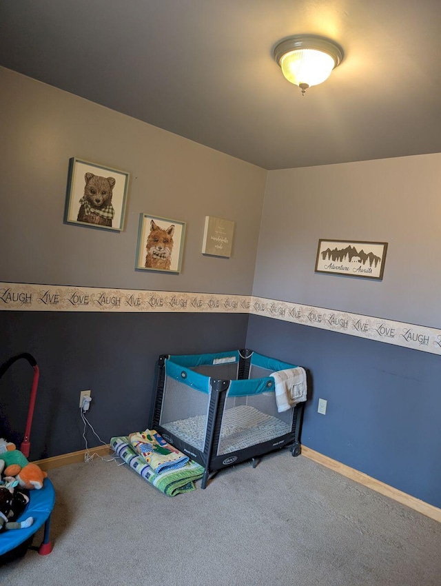 704 Kennebec River Rd, Embden, ME 04958 - carpeted bedroom featuring baseboards