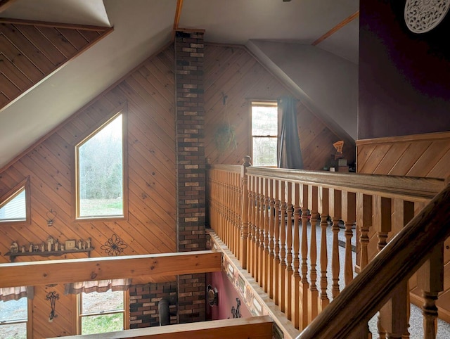 704 Kennebec River Rd, Embden, ME 04958 - stairway featuring plenty of natural light, wooden walls, and vaulted ceiling