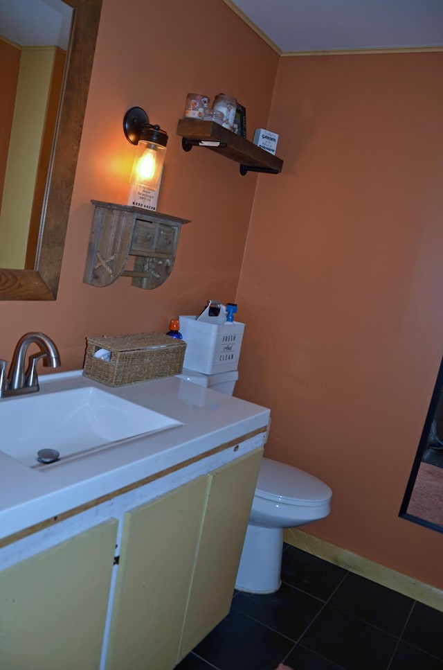 13 Hazen St, Norway, ME 04268 - bathroom featuring toilet, tile patterned flooring, vanity, and baseboards