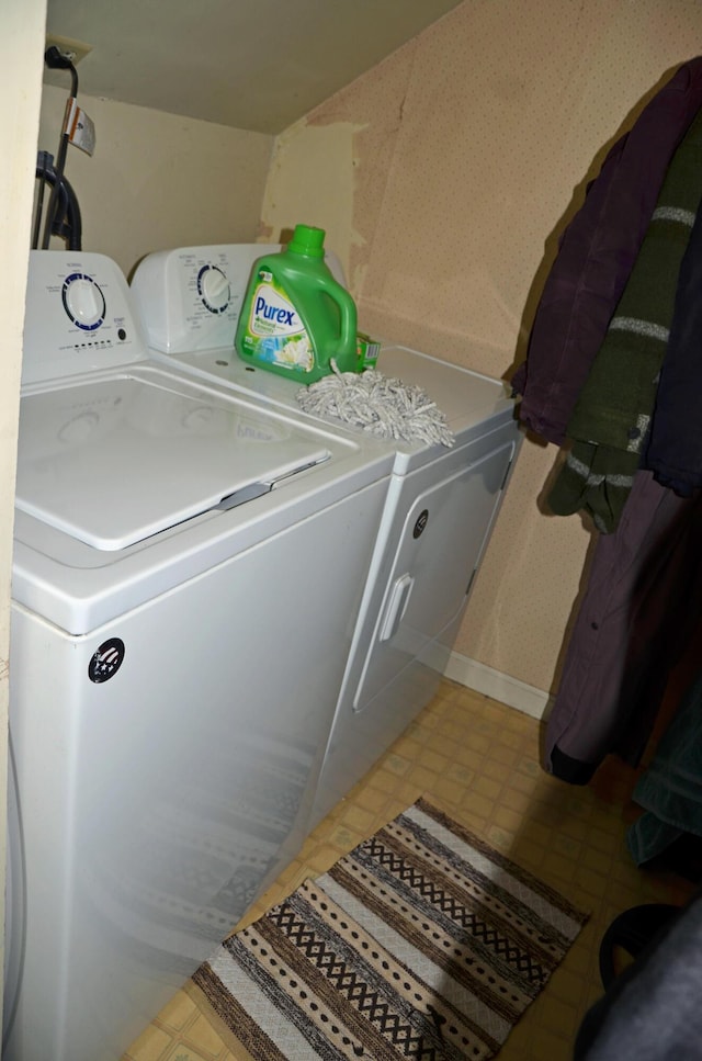 13 Hazen St, Norway, ME 04268 - washroom featuring tile patterned floors, washer and dryer, and laundry area