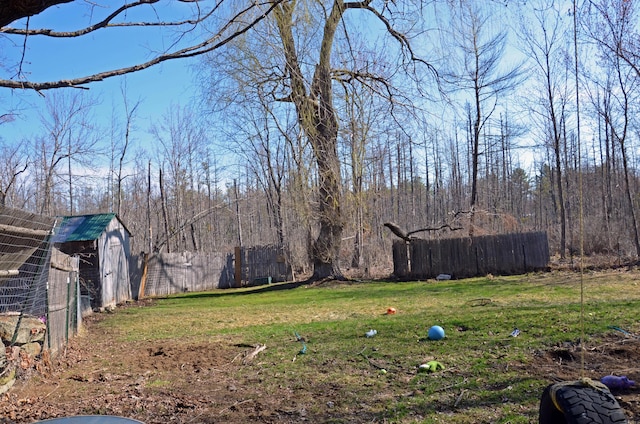 13 Hazen St, Norway, ME 04268 - view of yard with fence, an outbuilding, and a storage shed