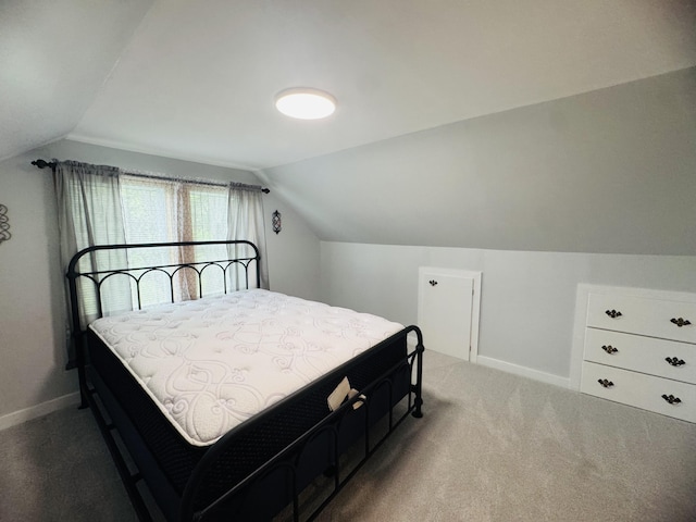 10 Laurette Cir, Caribou, ME 04736 - carpeted bedroom featuring vaulted ceiling and baseboards
