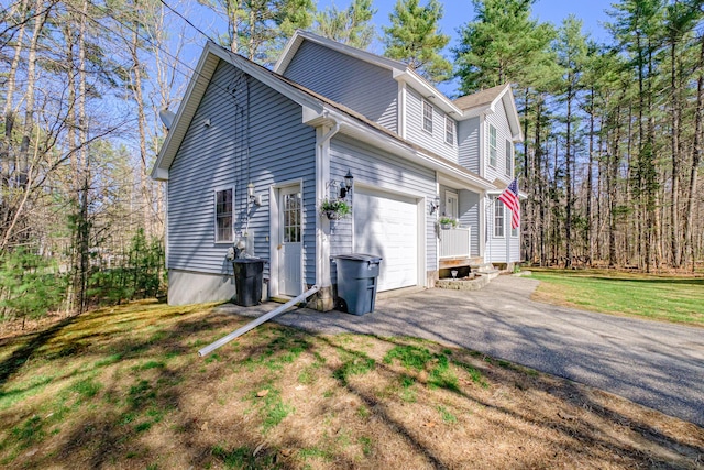 11 Sunny Brook Cir, Waterboro, ME 04061 - view of home's exterior with an attached garage and driveway