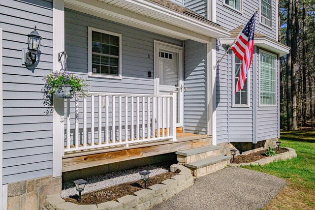 11 Sunny Brook Cir, Waterboro, ME 04061 - doorway to property featuring covered porch