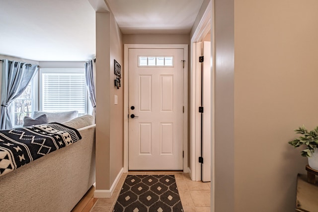 11 Sunny Brook Cir, Waterboro, ME 04061 - doorway to outside with baseboards and light tile patterned flooring
