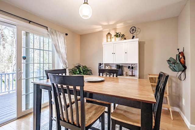 11 Sunny Brook Cir, Waterboro, ME 04061 - dining area with baseboards and light wood-type flooring