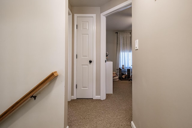 11 Sunny Brook Cir, Waterboro, ME 04061 - hallway featuring carpet floors, baseboards, and an upstairs landing