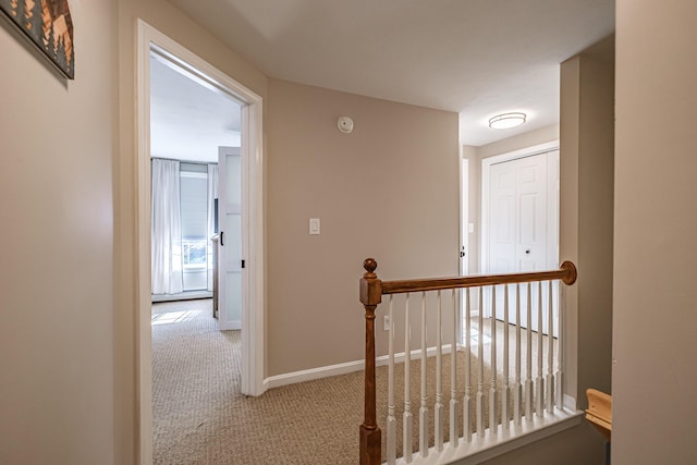 11 Sunny Brook Cir, Waterboro, ME 04061 - hallway featuring baseboards, carpet, and an upstairs landing
