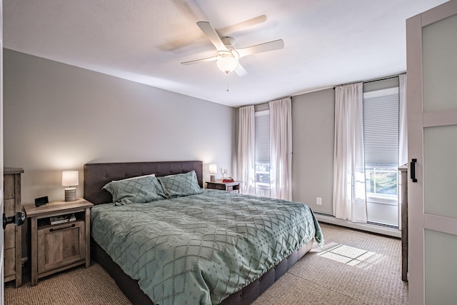 11 Sunny Brook Cir, Waterboro, ME 04061 - carpeted bedroom featuring a baseboard radiator and a ceiling fan