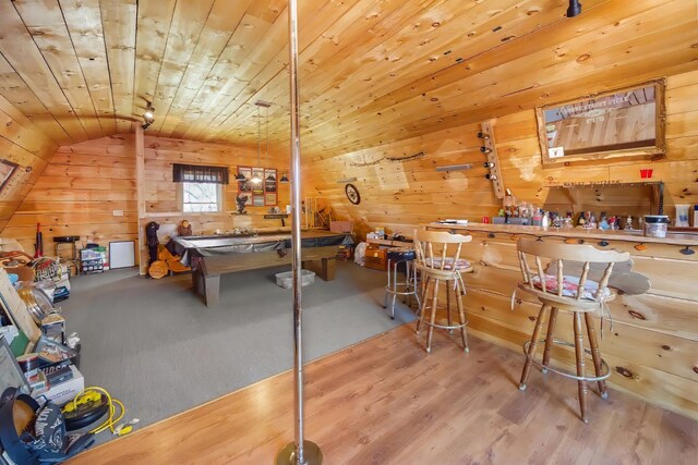 550 Ohio St, Bangor, ME 04401 - game room with wooden walls, a bar, wood finished floors, and lofted ceiling