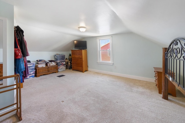 550 Ohio St, Bangor, ME 04401 - additional living space with baseboards, carpet flooring, and lofted ceiling