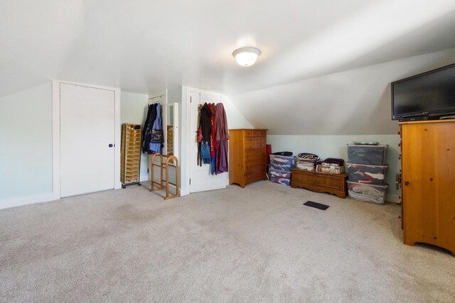 550 Ohio St, Bangor, ME 04401 - additional living space with carpet and vaulted ceiling