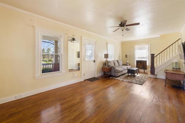 550 Ohio St, Bangor, ME 04401 - living area featuring stairs, ceiling fan, a healthy amount of sunlight, and hardwood / wood-style floors