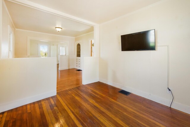 550 Ohio St, Bangor, ME 04401 - unfurnished room featuring visible vents, ornamental molding, baseboards, and hardwood / wood-style floors