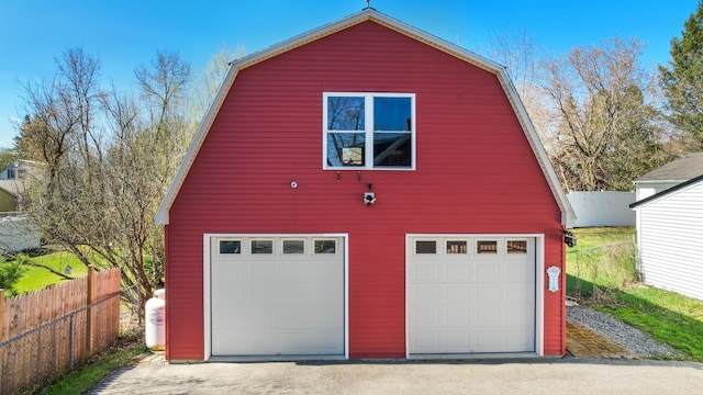 550 Ohio St, Bangor, ME 04401 - garage featuring fence and a garage