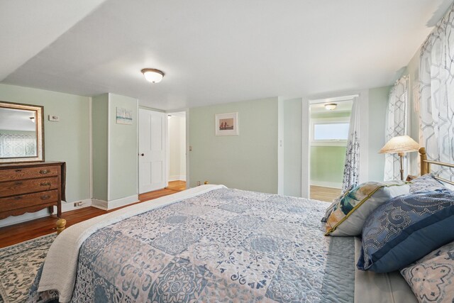 30 Pine St, Thomaston, ME 04861 - bedroom with baseboards and wood finished floors